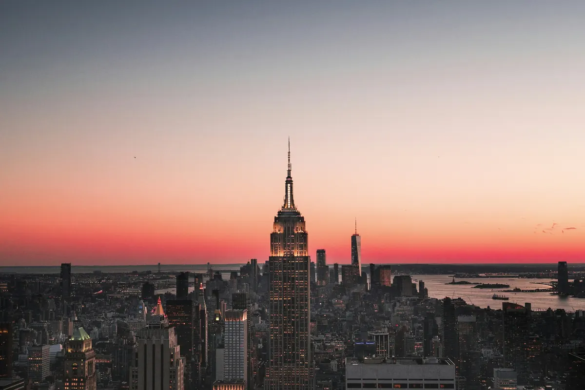 The Empire State Building at dusk over Manhattan